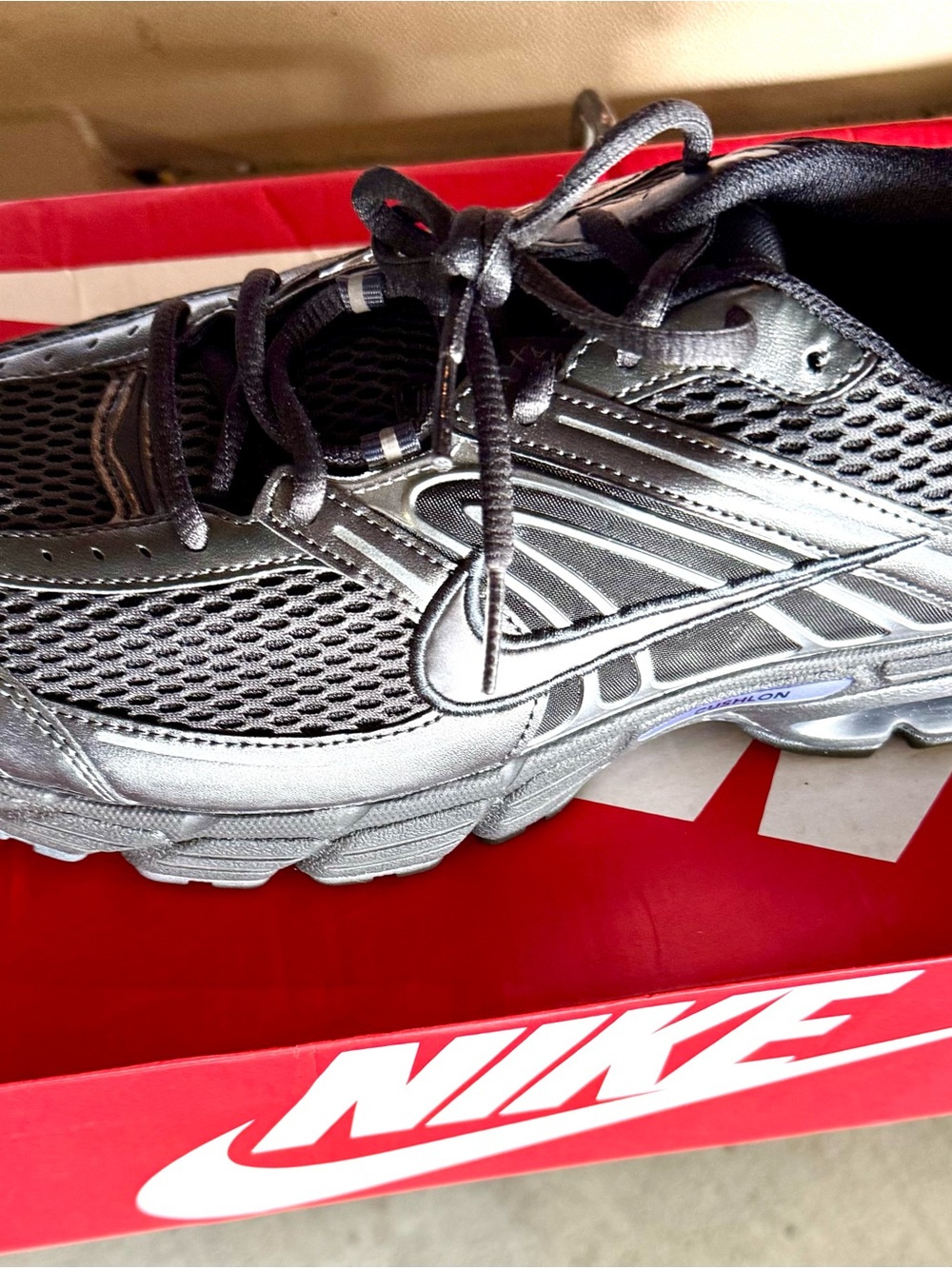 Nike Men’s Silver and Black Athletic Running Shoes